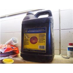 Power Fist All Season Multigrade Hydraulic Oil, Mostly Full