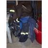 Image 1 : Bucket of used Coveralls
