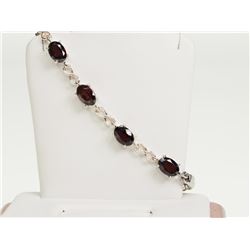 #18-STERLING SILVER GARNET BRACELET