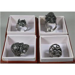 FOUR STAINLESS STEEL MEN'S SKULL RINGS