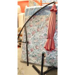 LARGE OVERHANGING PATIO UMBRELLA (HAS SUN FADING)