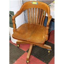 VINTAGE OAK SWIVEL ARMCHAIR