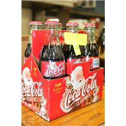 CASE OF 1999 CHRISTMAS COCA COLA GLASS BOTTLES