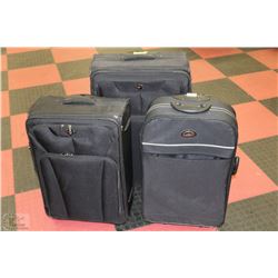 LOT OF 3 SUITCASES INCLUDING 1 EXTRA LARGE AND 2