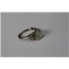 Image 1 : LADIES 18KT WHITE GOLD DIAMOND SET ENGAGEMENT OR DRESS RING WITH A VARIATION OF A SOLITAIRE DESIGN.