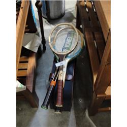 3 tennis rackets and suitcase
