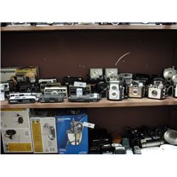Shelf of vintage cameras
