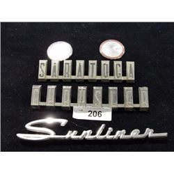 pair of Dodge Charger emblems, Saratoga emblem, Chrysler and Sunliner emblems