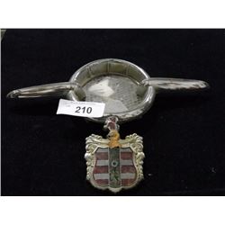 2 vintage car emblems