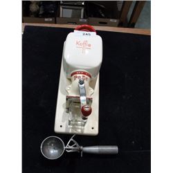 Vintage coffee grinder and metal scoop
