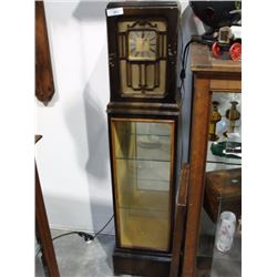 Unusual clock display cabinet
