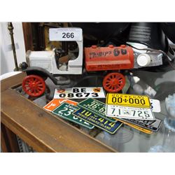 Cast iron truck and collection of 1954 bicycle plates