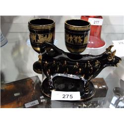 Pair of goblets and cow creamer