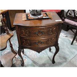 Highly carved end table