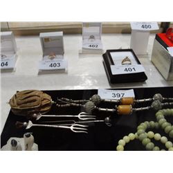 Carved stone pendant on bead necklace and 3 sterling pickle forks