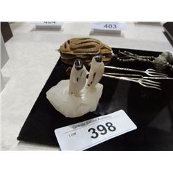 Marine ivory penguins on quartz
