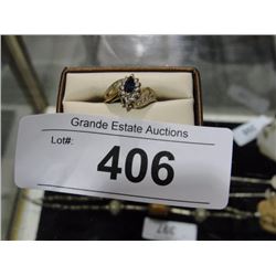 10 kt gold sapphire & diamond ring. Appraised value $700. appraisal inc