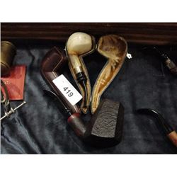 2 pipes and 2 pipe cases