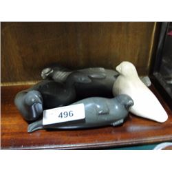 5 carved soapstone figures.