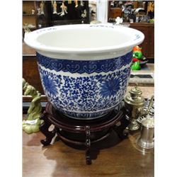 Large Asian planter on stand.
