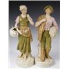 Image 1 : A pair of Royal Dux rustic figures, pad and printed marks to base, impressed 2445 and 2446, 32...