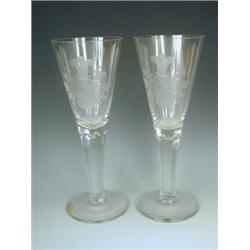 A pair of Thuringian glass goblets each with heraldic crests and an engraved inscription on th...