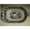 Image 1 : A blue and white pearlware chestnut basket printed with oriental figures drying nets, impresse...