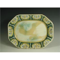 A Royal Doulton pottery serving dish, designed by Frank Brangwyn R.A., with borders of incised...