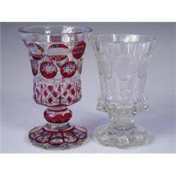 Two 19th Century Bohemian glass goblets, both with engraved panels depicting classical buildin...