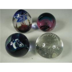 Three modern Caithness paperweights and a bubbled glass weight, tallest 10cm Est. 80/120...