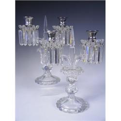 A pair of twin branch glass candelabrum with silver plated sconces and the drip tray with pris...