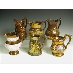 Six 19th Century lustre jugs, three decorated with moulded dancers, deer and hunters, three ot...