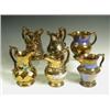 Image 1 : Six late 19th Century copper lustre jugs, each of different baluster form, one moulded with da...