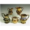 Image 1 : Five late 19th Century copper lustre jugs, each of different form, three with polychrome decor...