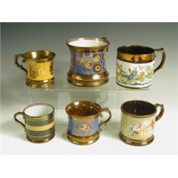 Six copper lustre mugs; three with concave shaped bodies, one with a printed and coloured chin...