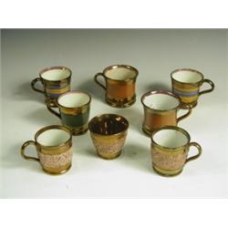 Eight small copper lustre cups Est. 40/60...