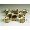 Image 1 : Eight small copper lustre cups Est. 40/60...