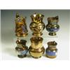 Image 1 : Six copper lustre jugs, five of baluster shape, one moulded with dancers, late 19th/20th Centu...