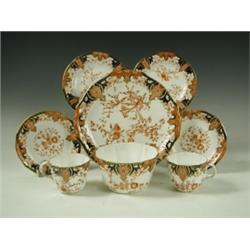 An early Edwardian Royal Crown Derby Imari pattern six place tea set, with sugar bowl and brea...