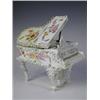 Image 1 : An early 20th Century German porcelain trinket box in the form of a floral encrusted grand pia...