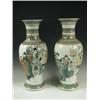 Image 1 : A pair of Famille Verte baluster vases decorated with a man behind a desk surrounded by figure...