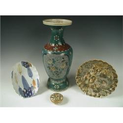 A Choshuzan Satsuma plate, painted with immortals, 19cm diameter, signed; a small Kinkozan Sat...