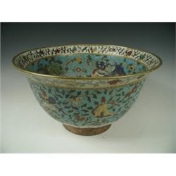 An early Japanese cloisonnT bowl, decorated with Shi-shi and Buddhist emblems, Fang Ming mark,...