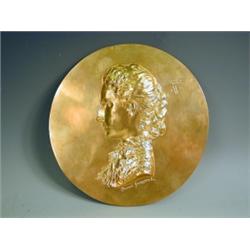 Conrad Dressler A circular bronze plaque of a European lady, with a crowned monogram and signa...