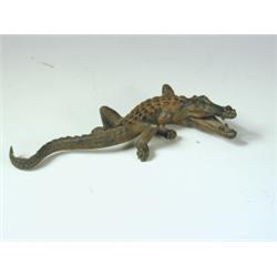 A cold painted bronze figure of a crocodile, 23cm long Est. 60/100...