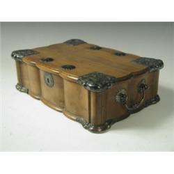 A 19th Century Eastern olivewood (?) box with white metal mounts and cast drop handles, 26 x 1...
