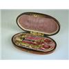 Image 1 : A 19th Century burr yew wood oval necessaire with mother of pearl inlay, with a velvet fitted...
