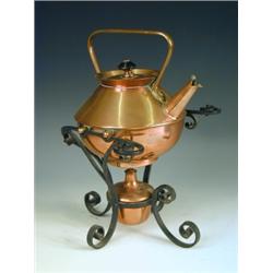 A Benham and Froud copper kettle on stand, with an ebonised knob, and a copper spirit burner,...