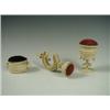 Image 1 : A Victorian ivory pin cushion in the form of an oval basket with ring handles, 6cm long Est...