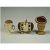 Image 1 : Three Victorian pin cushions: two in turned ivory , one with ring handles and one in turned ve...